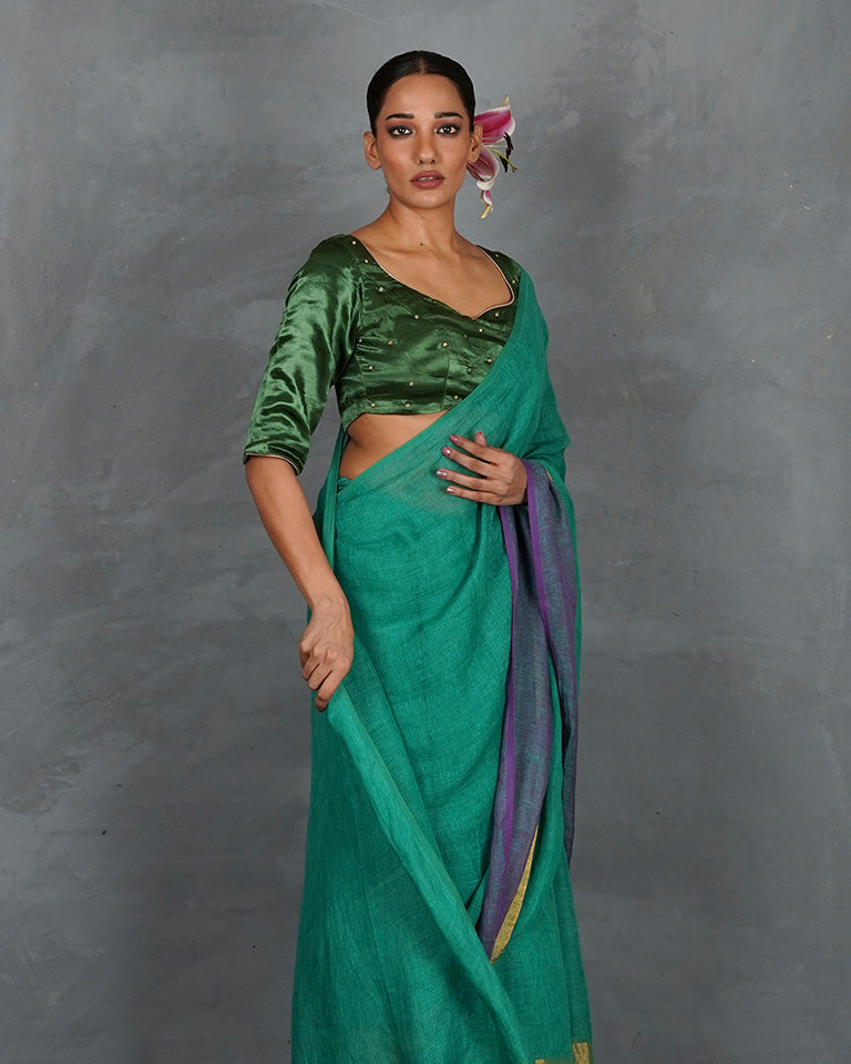 Shimmer On Green Handwoven Linen Saree - TARA