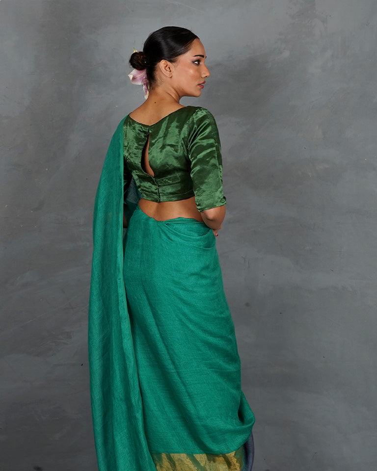 Shimmer On Green Handwoven Linen Saree - TARA