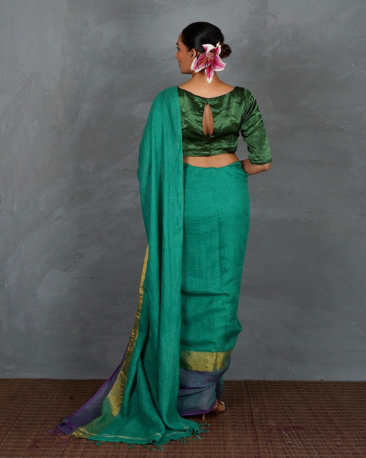 Shimmer On Green Handwoven Linen Saree - TARA