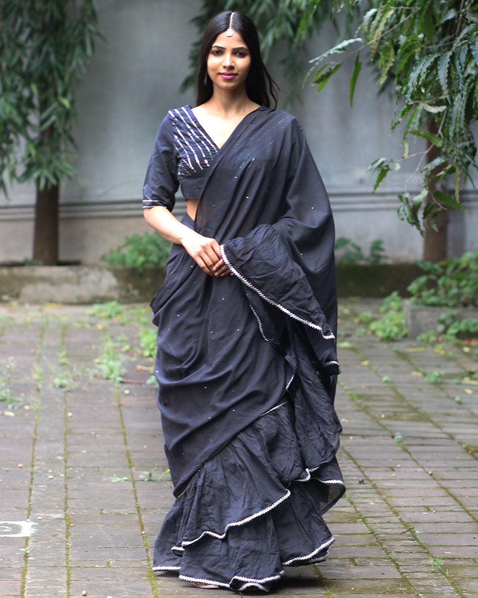 Get ready to shine in this stunning Shimmer Moss Green Mulmul Cotton Saree. Perfect for women who love cotton sarees with a trendy design.